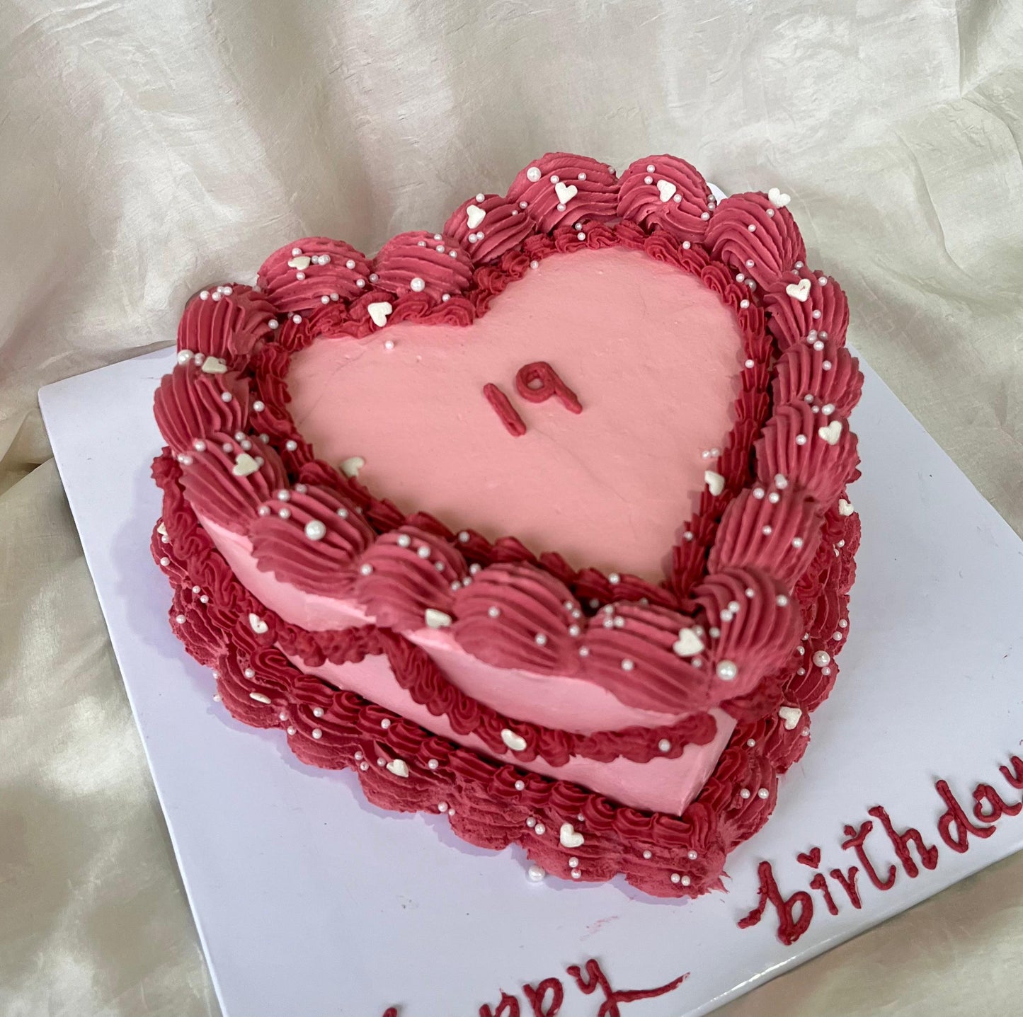 Heart-Shaped Pink Birthday Cake